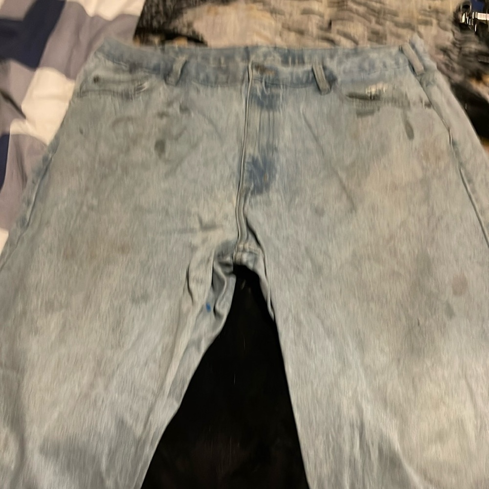 Used work pants with some stains